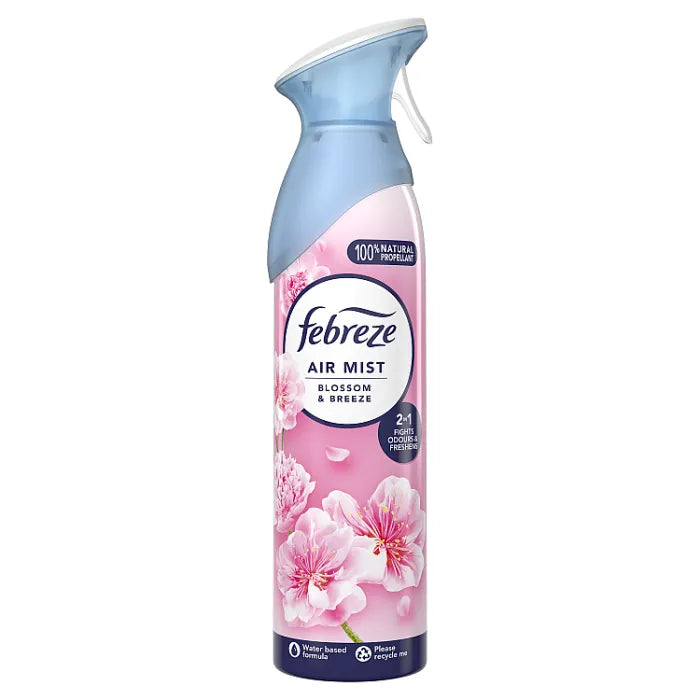Febreze air freshener spray bottle with floral design on a white background