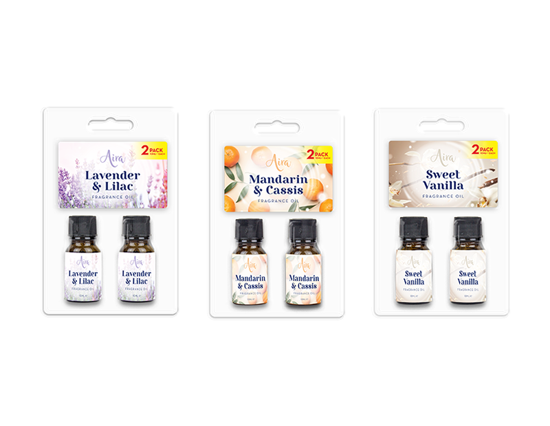 Three packages of essential oil blends with different scents on a white background